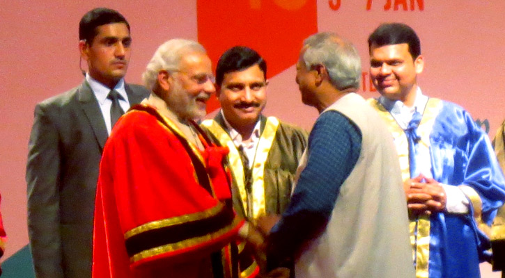 Dr.Yunus receives gold medal from Indian PM Modi Dr.Yunus receives gold medal from Indian PM Modi